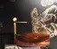 Смеситель для раковины Gessi Perle низкий, без донного клапана, с металлическим вентилем Brass PVD